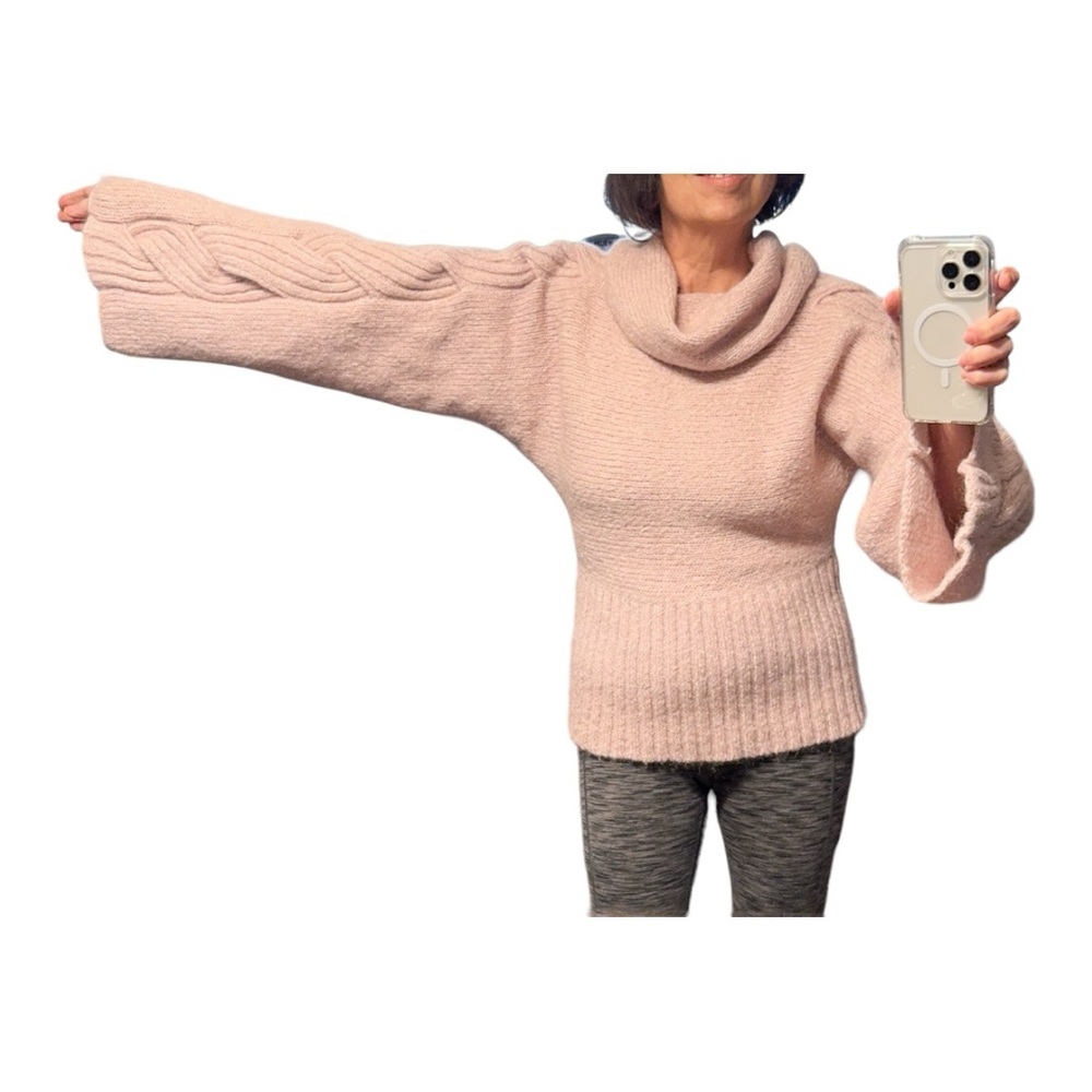 Very beautiful dust rose sweater with cable knit. Fancy!